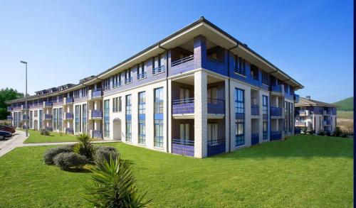 Apartamento de 1 dormitorio con vistas a la piscina del hotel Dunas De Liencres. Foto 1