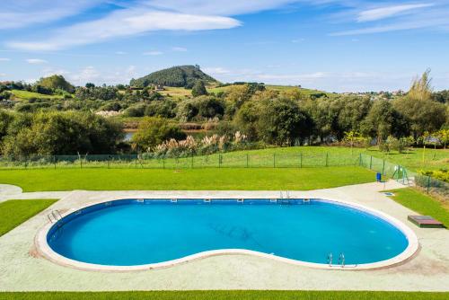 Apartamento de 1 dormitorio con vistas a la piscina del hotel Dunas De Liencres. Foto 13