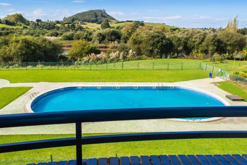 Apartamento de 1 dormitorio con vistas a la piscina del hotel Dunas De Liencres. Foto 16