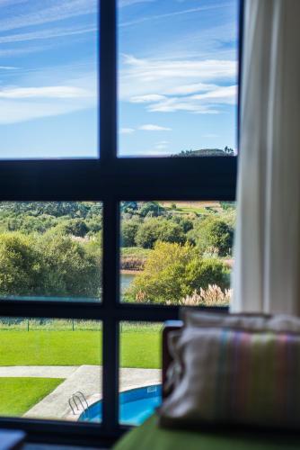 Apartamento de 1 dormitorio con vistas a la piscina del hotel Dunas De Liencres. Foto 17