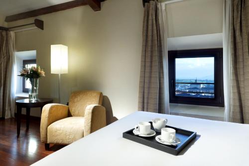 Habitación Doble con Cama supletoria del hotel Eurostars Palacio Santa Marta. Foto 3