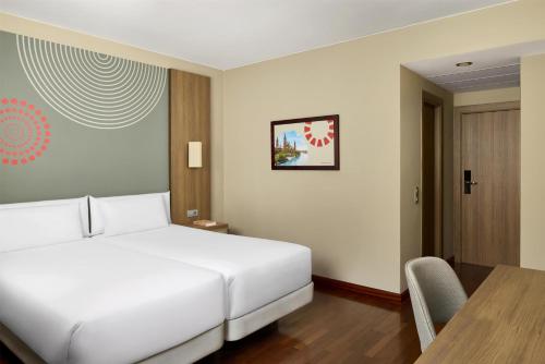 Habitación Doble Estándar - 1 o 2 camas del hotel iStay by NH Zaragoza Sport. Foto 3