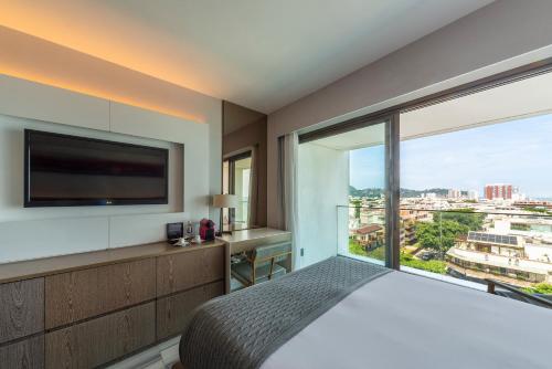 Habitación Doble Deluxe con vistas laterales al mar del hotel Lifestyle Laghetto Collection. Foto 4