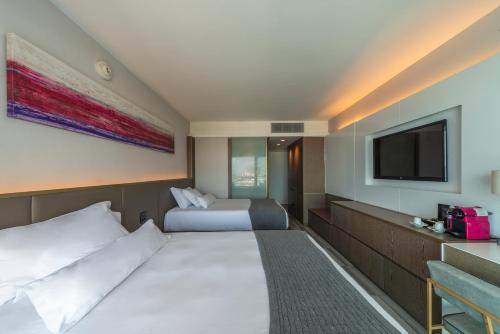 Habitación Doble Deluxe con vistas laterales al mar del hotel Lifestyle Laghetto Collection. Foto 5