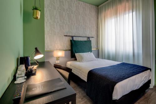 Habitación Doble Clásica del hotel Best Western Plus CHC Florence. Foto 1