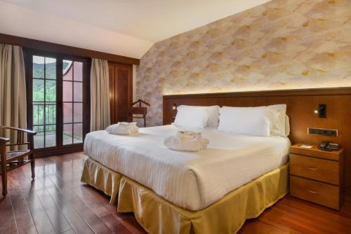 Habitación Doble Superior - 1 o 2 camas del hotel & Spa Monasterio de Boltaña. Foto 1