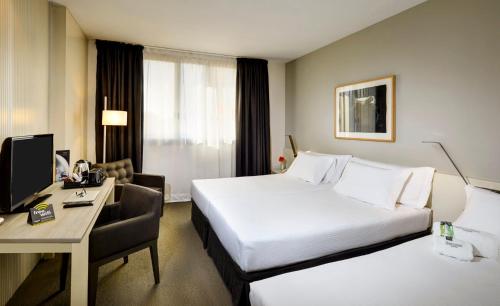 Habitación Triple del hotel Sercotel Amister Art. Foto 1
