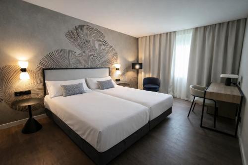 Habitación Doble - 2 camas del hotel Urh Ciutat De Mataró. Foto 1