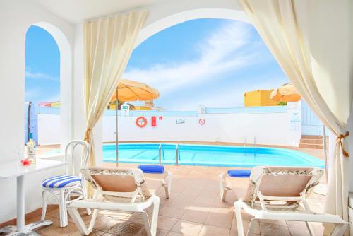 Apartment with Pool View del hotel Bungalows Neptuno - Adults Only. Foto 17