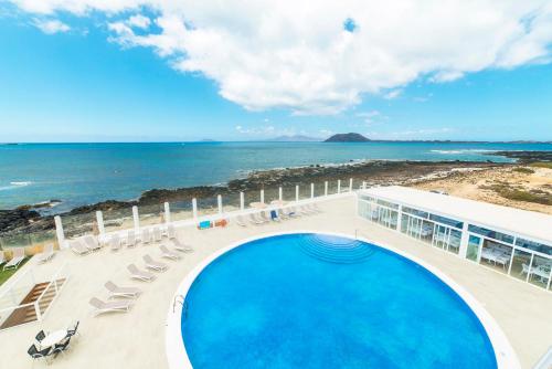 Suite Deluxe con vistas al mar del hotel Boutique Tao Caleta Mar. Foto 1
