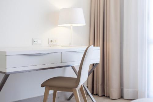 Habitación Triple del hotel Boutique Tao Caleta Mar. Foto 11