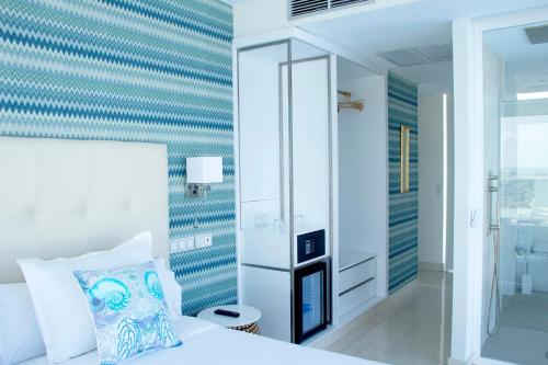 Suite Deluxe con vistas al mar del hotel Boutique Tao Caleta Mar. Foto 3