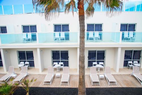 Habitación Doble con vistas al mar del hotel Boutique Tao Caleta Mar. Foto 8