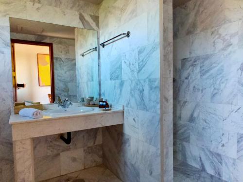 Habitación doble Balcón o Terraza Vista jardín o piscina 2 Camas individuales del hotel Surfescape Fuerteventura. Foto 9