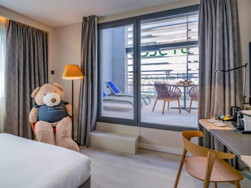 Habitación Doble Deluxe con terraza del hotel Novotel Madrid City Las Ventas