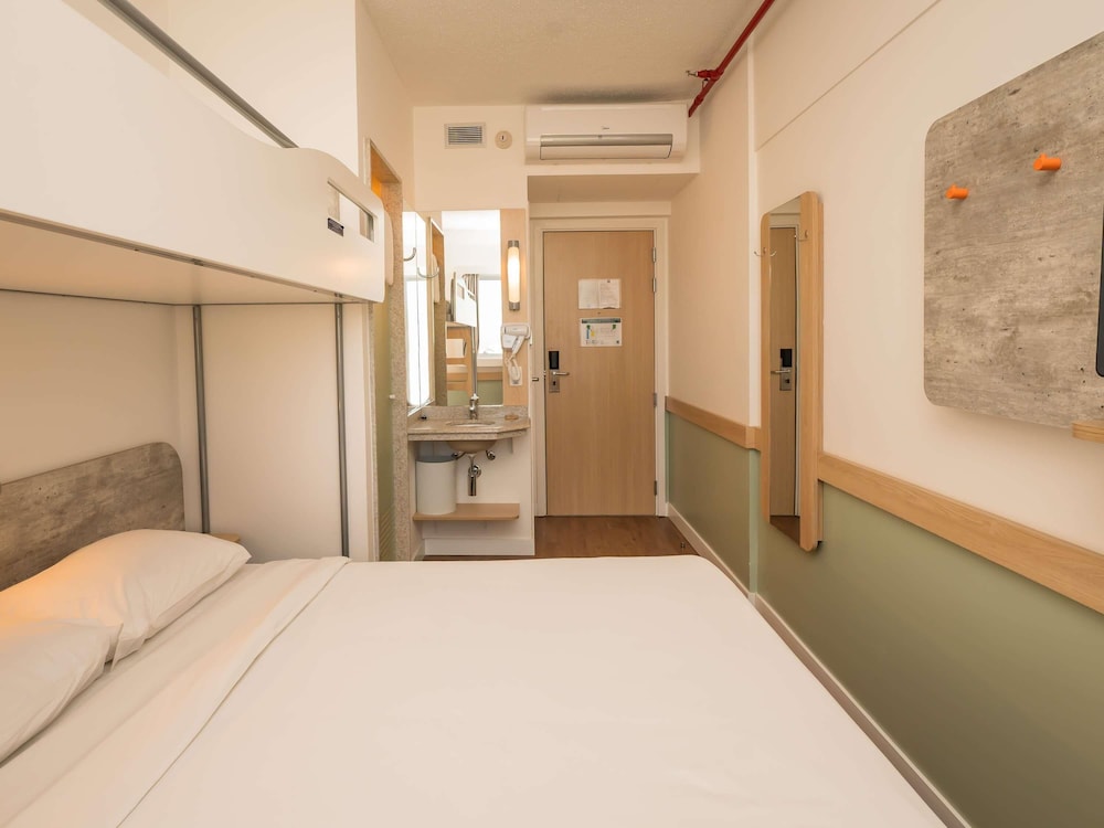 Apartamento Superior con 1 cama doble y 1 cama superpuesta del hotel Ibis Budget Campinas Aquidaban. Foto 1