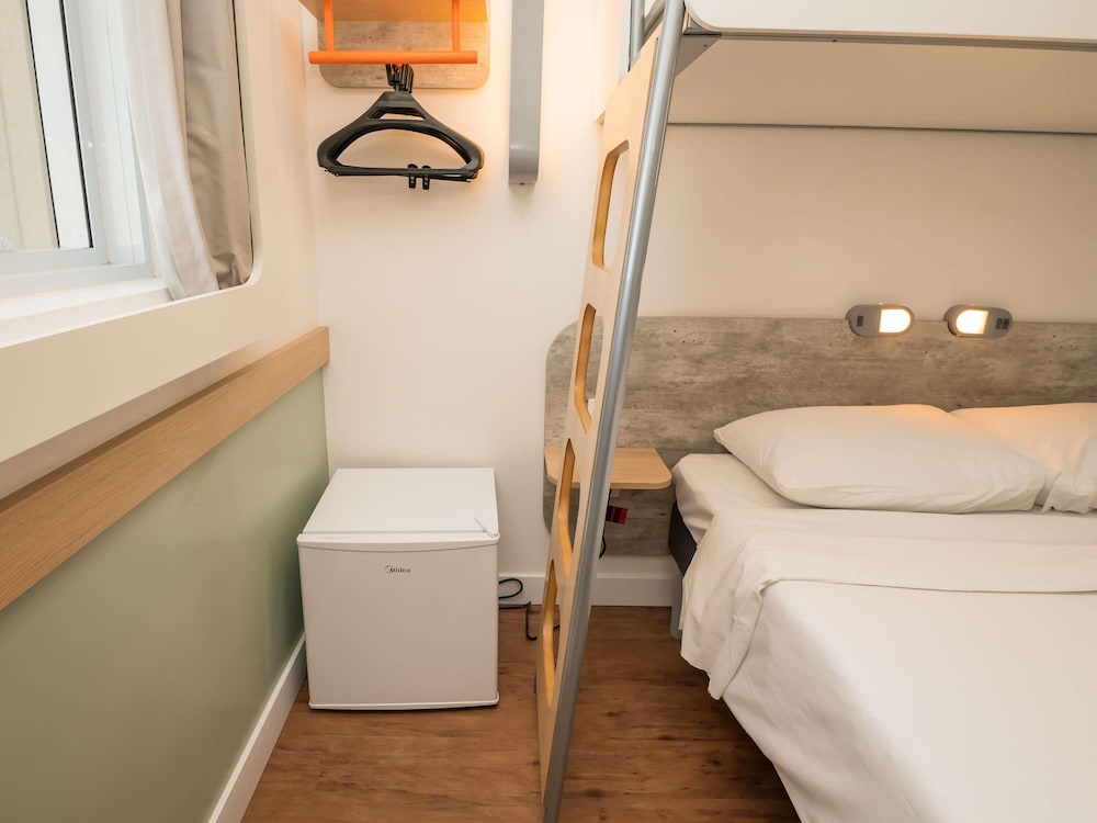 Apartamento Superior con 1 cama doble y 1 cama superpuesta del hotel Ibis Budget Campinas Aquidaban. Foto 4