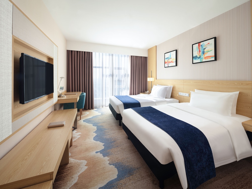 Habitación estándar con camas gemelas del hotel Ibis Styles Changsha International Exhibition Center. Foto 3