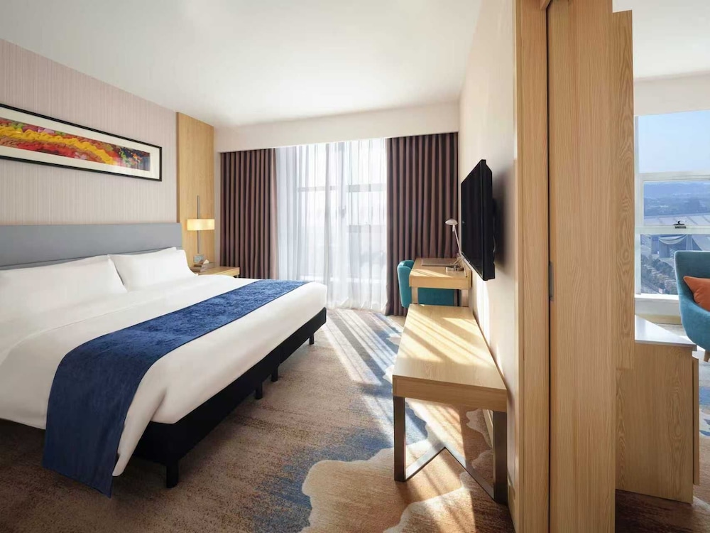 Suite estándar con 1 cama king size, vistas a la ciudad del hotel Ibis Styles Changsha International Exhibition Center. Foto 2