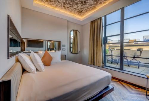 Habitación Doble Deluxe con terraza del hotel New Road. Foto 6