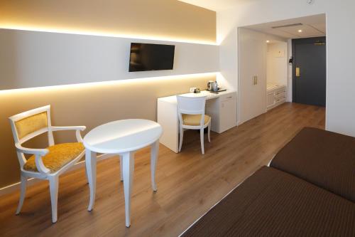 Habitación Doble - 2 camas del hotel Sercotel Alfonso Xiii. Foto 3