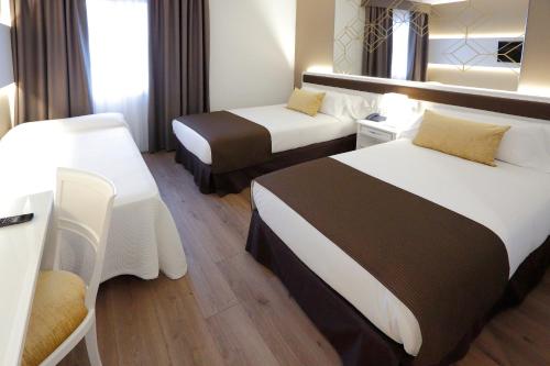 Habitación Triple del hotel Sercotel Alfonso Xiii