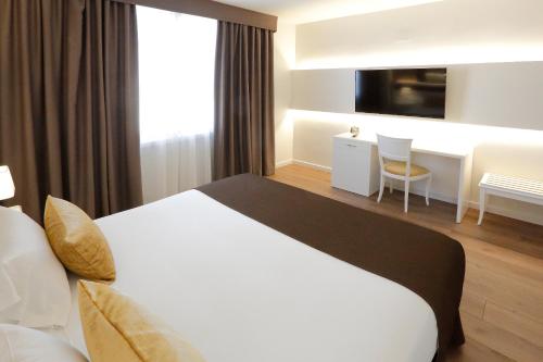 Junior Suite del hotel Sercotel Alfonso Xiii. Foto 1