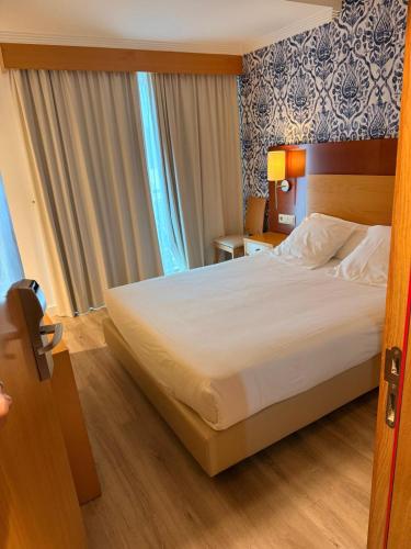 Habitación Doble Pequeña del hotel Canelas. Foto 1