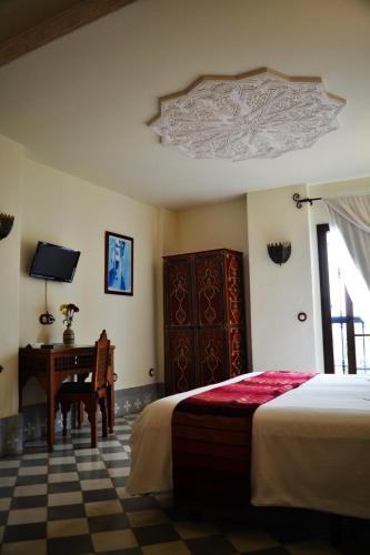 Habitación Triple del hotel Alcoba Del Rey De Sevilla Boutique