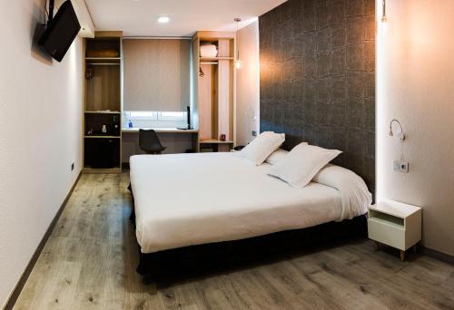 Oferta romántica - Habitación Deluxe con cama extragrande del hotel Bellavista Sevilla. Foto 1