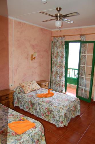 Habitación Doble Económica - 1 o 2 camas del hotel El Sombrerito. Foto 4
