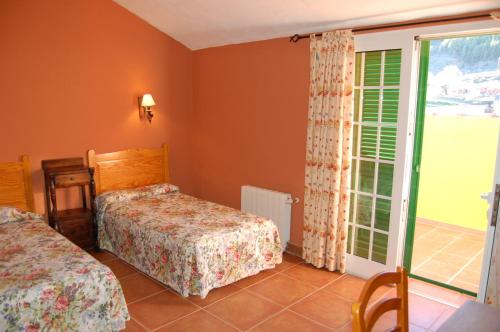 Habitación Doble Económica - 1 o 2 camas del hotel El Sombrerito. Foto 7