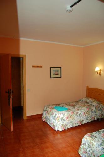 Habitación Doble Económica - 2 camas del hotel El Sombrerito. Foto 2