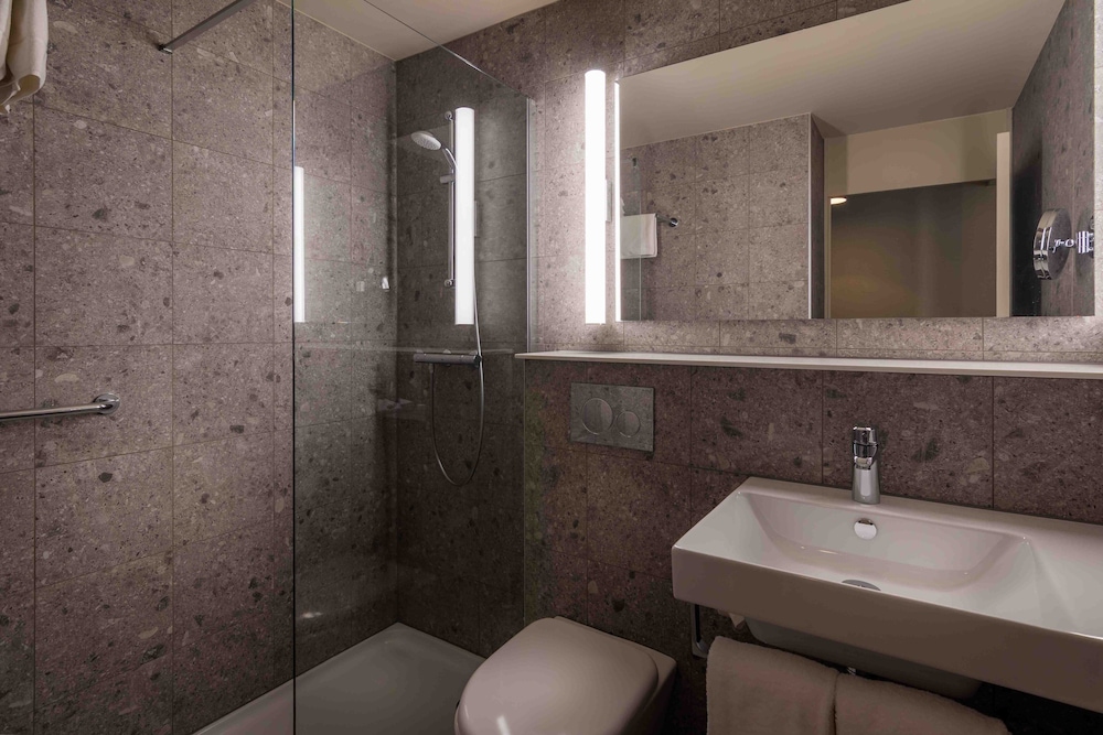 Habitación Premium, 1 cama de matrimonio grande con sofá cama del hotel Holiday Inn Airport Brussels. Foto 5