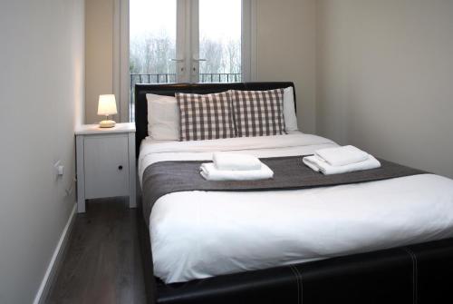 Suite con balcón y baño privado del hotel Guest House London. Foto 4
