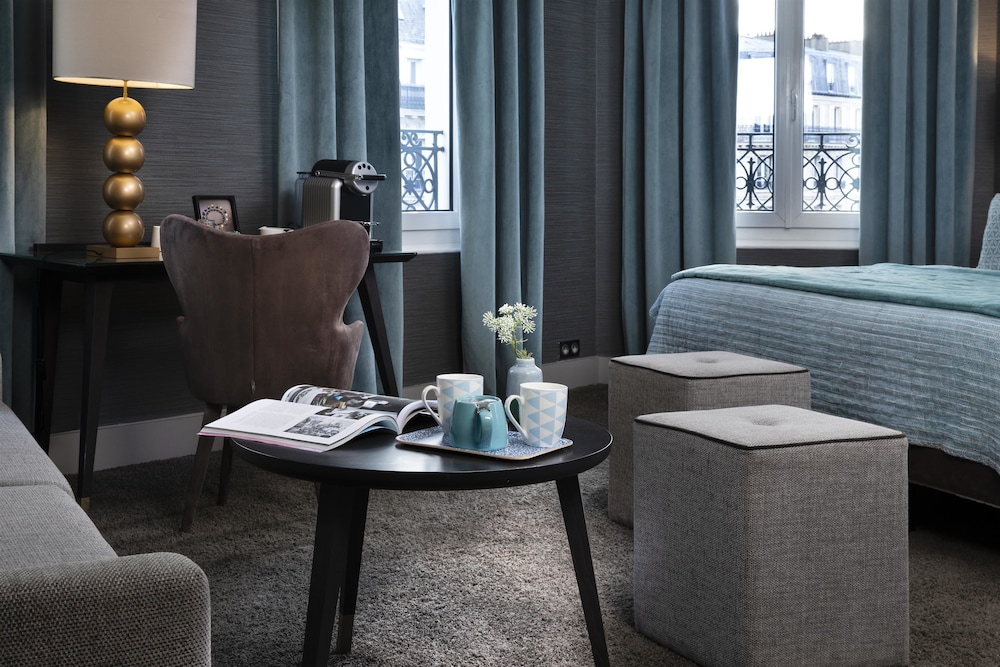 Habitación Deluxe con 1 cama doble o 2 individuales del hotel Plaza Etoile. Foto 4