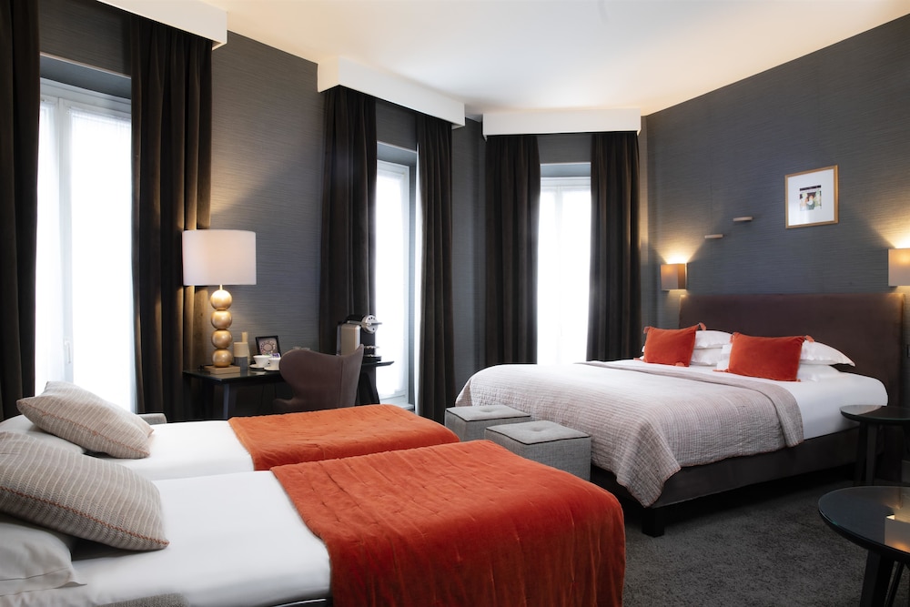 Habitación Deluxe con 1 cama doble o 2 individuales del hotel Plaza Etoile. Foto 5