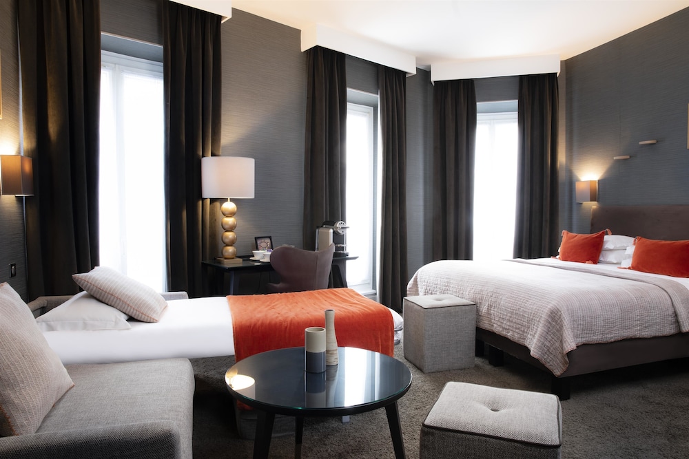 Habitación Deluxe con 1 cama doble o 2 individuales del hotel Plaza Etoile. Foto 8