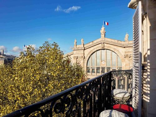 Extra Large Room with Balcony and Paris View del hotel 25hours Hotel Terminus Nord. Foto 2