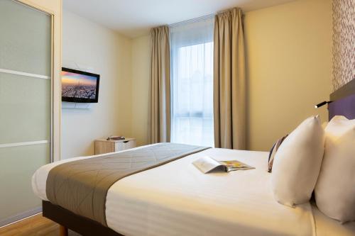 Apartamento de 1 dormitorio con vistas a la Torre Eiffel del hotel Citadines Tour Eiffel Paris. Foto 1