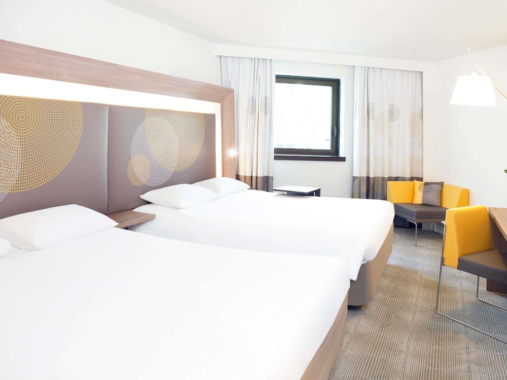 Habitación ejecutiva, 2 camas de matrimonio del hotel Novotel Les Halles. Foto 3