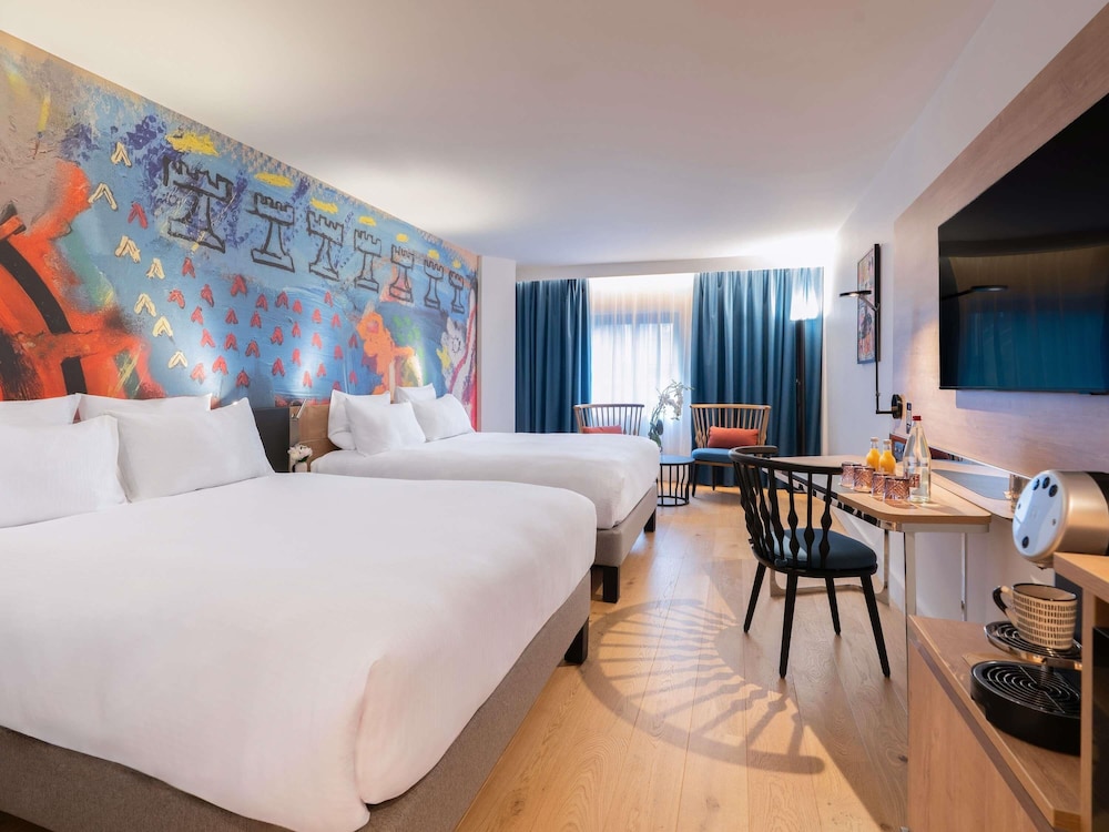 Habitación ejecutiva, 2 camas de matrimonio del hotel Novotel Les Halles. Foto 5
