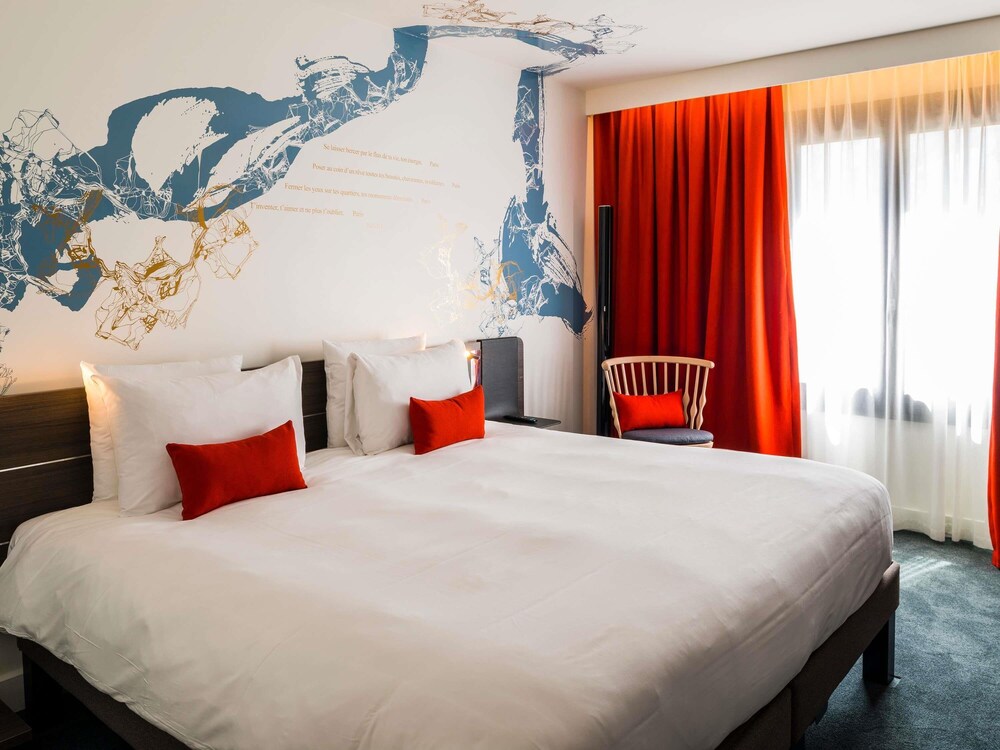 Habitación ejecutiva, 1 cama de matrimonio grande del hotel Novotel Les Halles. Foto 5