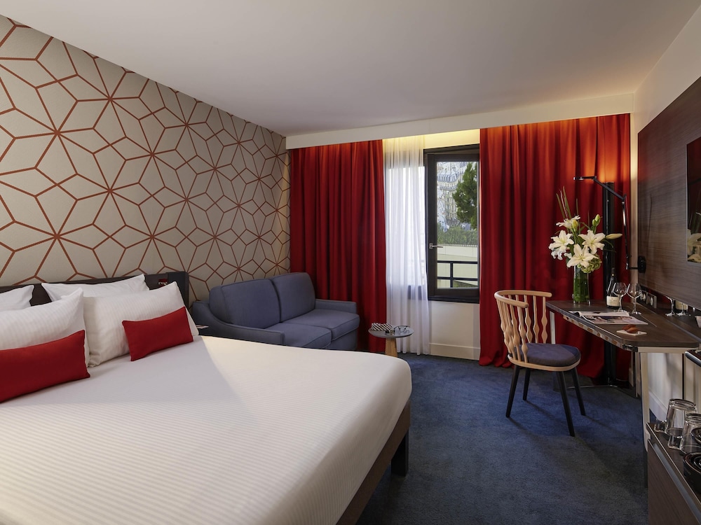 Habitación doble 1 Cama queen Business Sofá Cama incluido Normal del hotel Novotel Les Halles. Foto 4