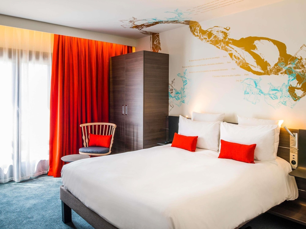 Habitación ejecutiva, 1 cama de matrimonio grande del hotel Novotel Les Halles. Foto 6