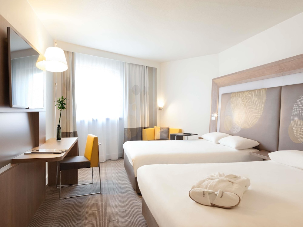 Habitación ejecutiva, 2 camas de matrimonio del hotel Novotel Les Halles. Foto 3