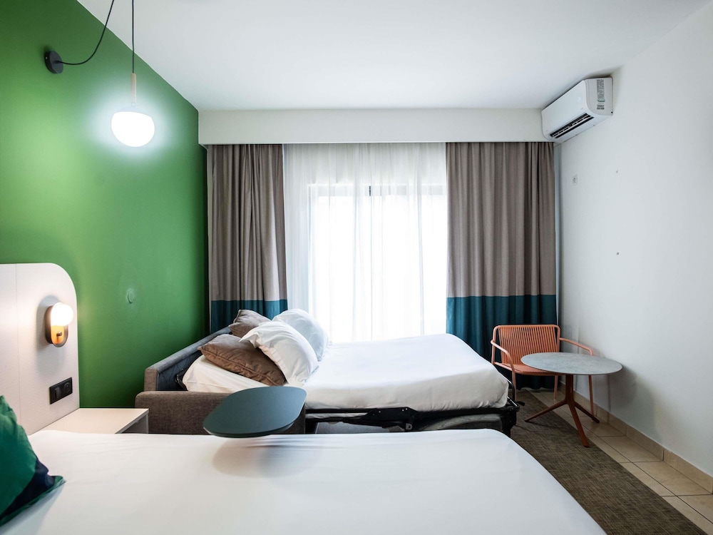 Habitación Estandar del hotel Hôtel Amazonia. Foto 3