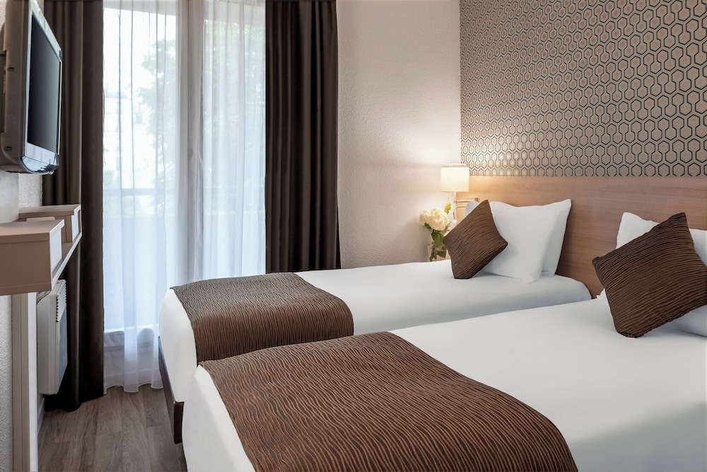 Estudio Deluxe, balcón del hotel Citadines Bastille Gare De Lyon. Foto 5