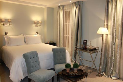 2 Habitaciones Executive Comunicadas del hotel My Home in Paris. Foto 1