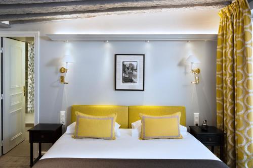 Habitaciones comunicadas del hotel Le Relais Saint Honoré. Foto 2